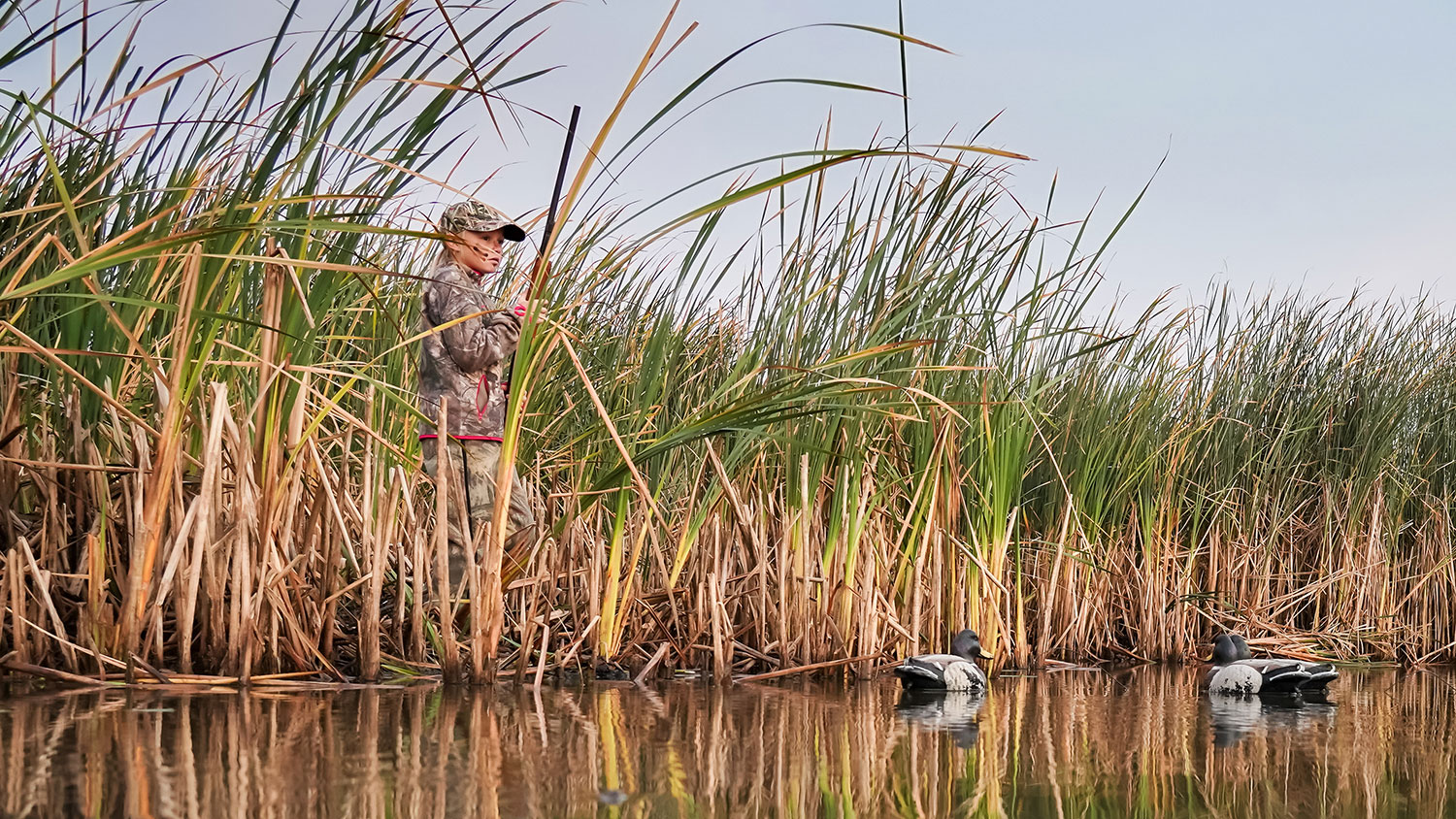 Young girl waterfowl hunting