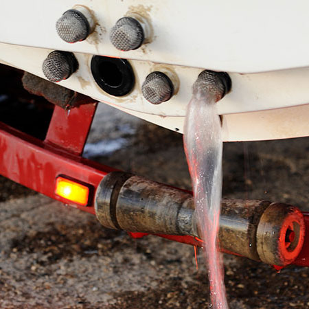 Water coming out of open boat plug